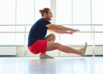 man practicing balance exercises from Precision Brain Center for Brain Rehab