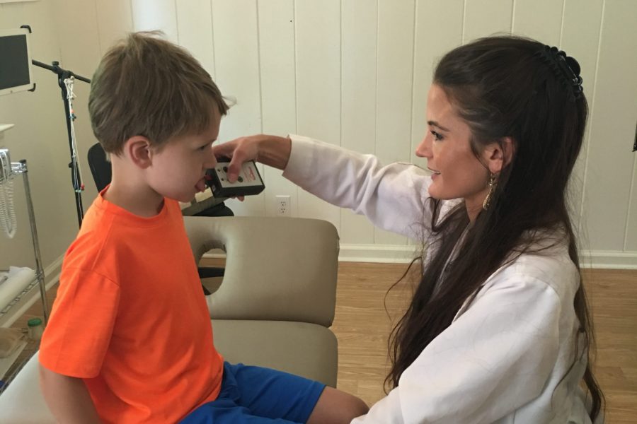 a patient receiving functional neurology treatment for neurodevelopmental disorders at Precision Brain Center in Raleigh NC